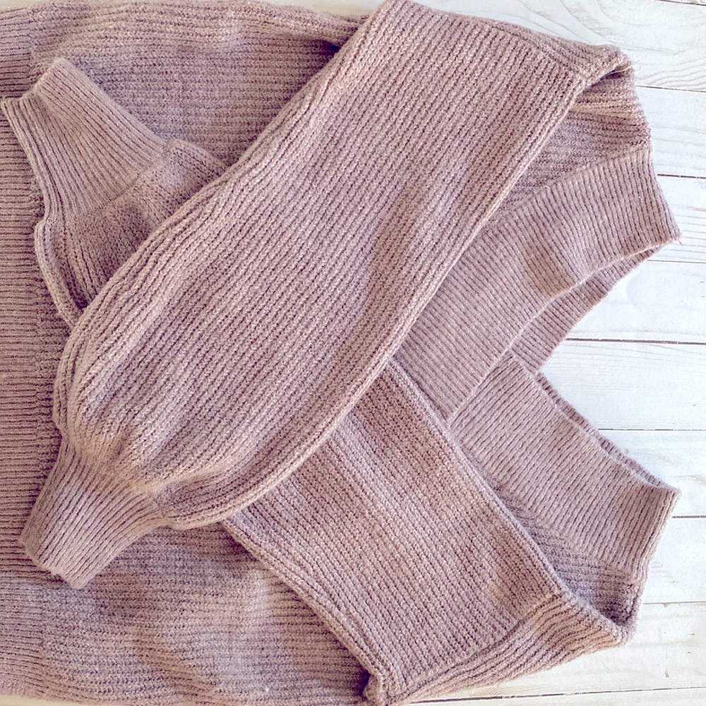 Lavender Sweater with cross v neck.